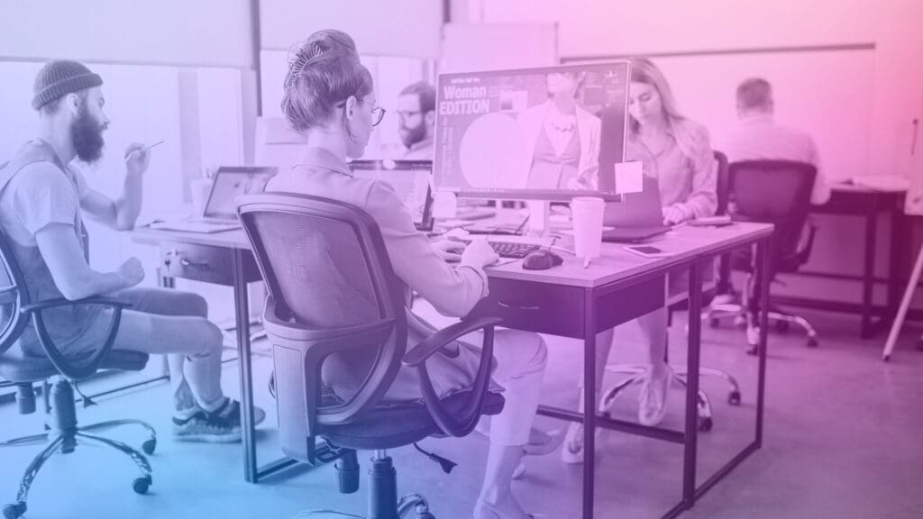 A creative workspace setup with a computer displaying a blog post, highlighting blog content creation best practices